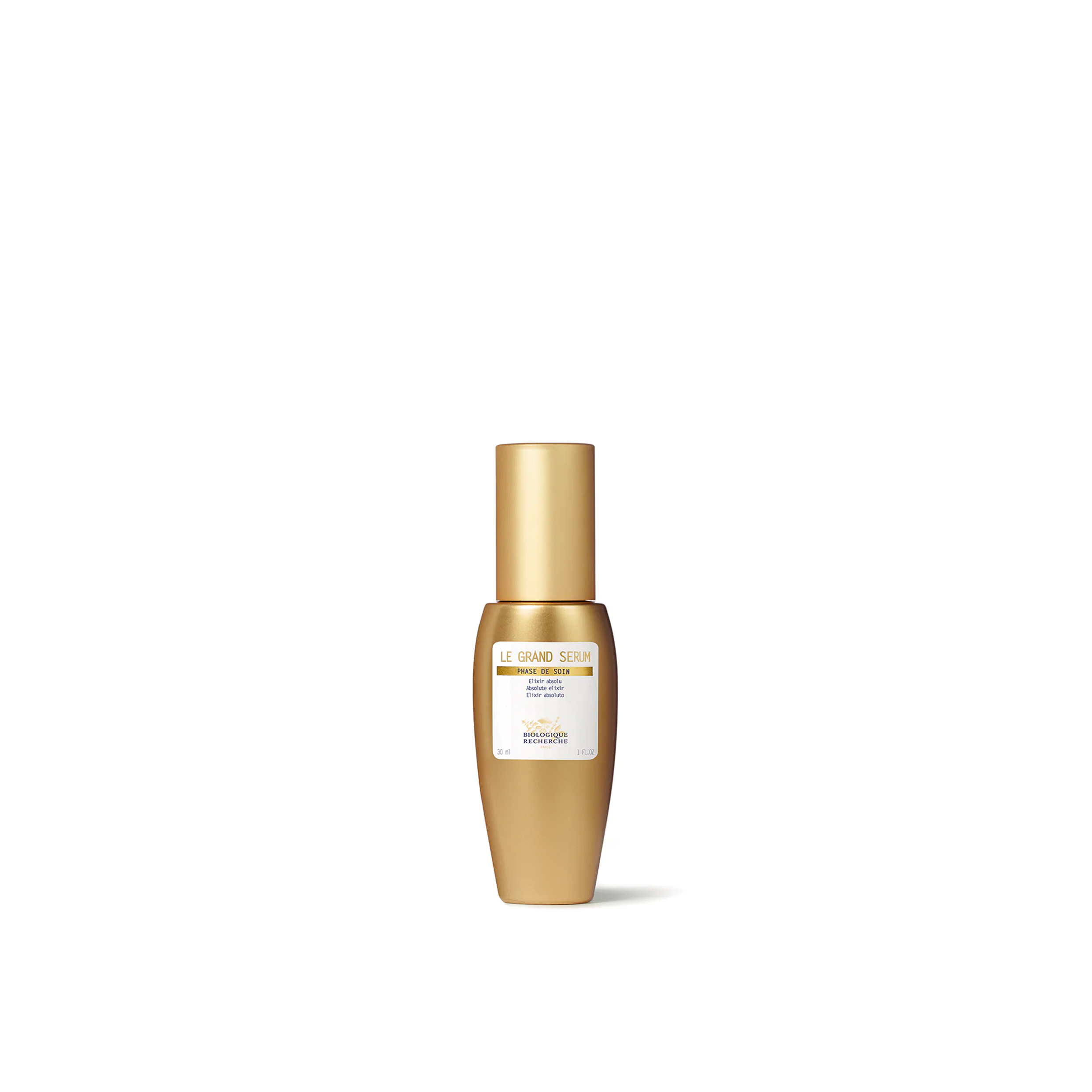 A golden glass bottle of Biologique Recherche Le Grand Serum, containing a skin care serum.