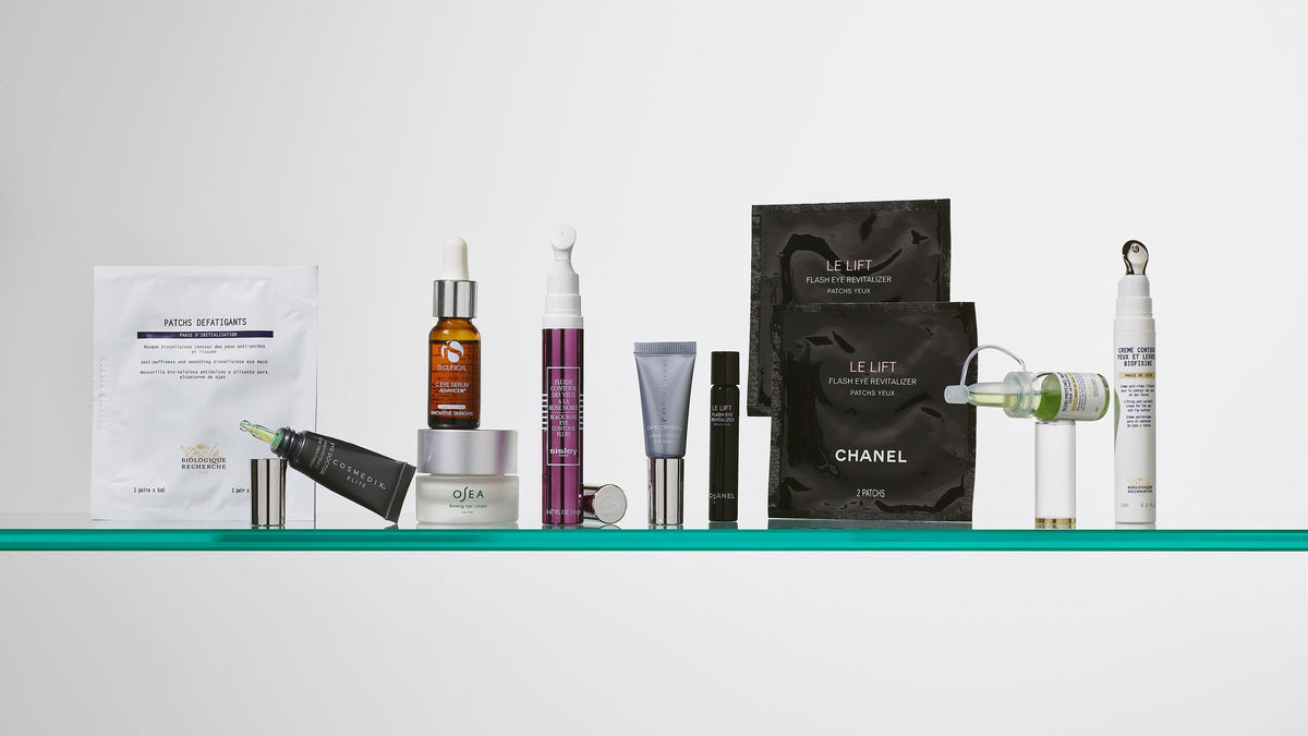 Skincare products arranged on a glass shelf from the Dark Circles photography archive
