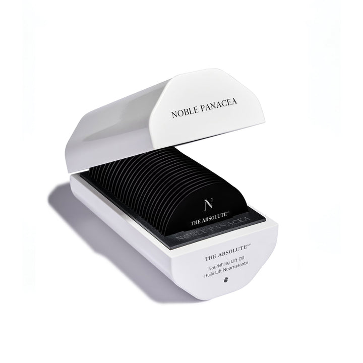 White box containing black face moisturiser with 'Noble Panacea' branding on a white background