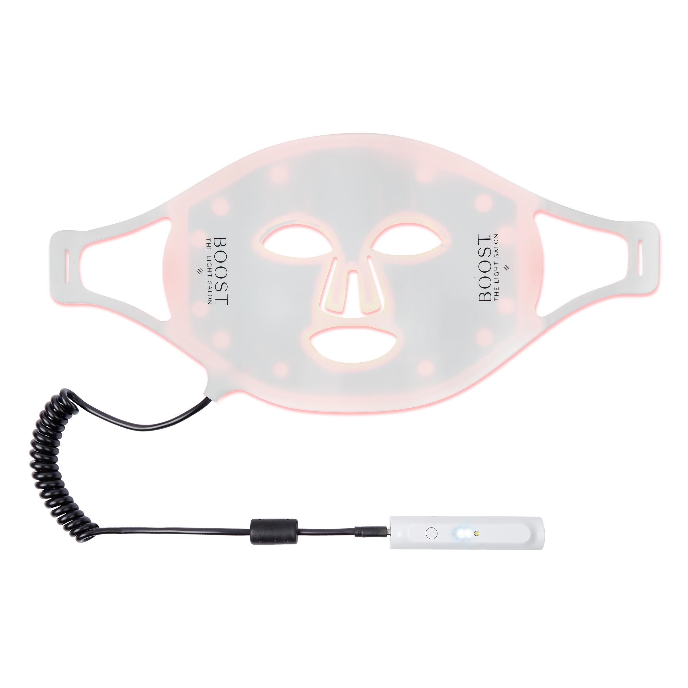 A light therapy mask with a clear, silicone base, and a coiled power cord. The mask is designed to fit on the face, with cutouts for the eyes and mouth.