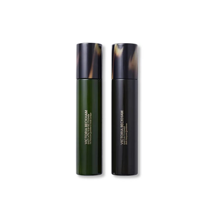 Two Victoria Beckham skincare bottles on a white background