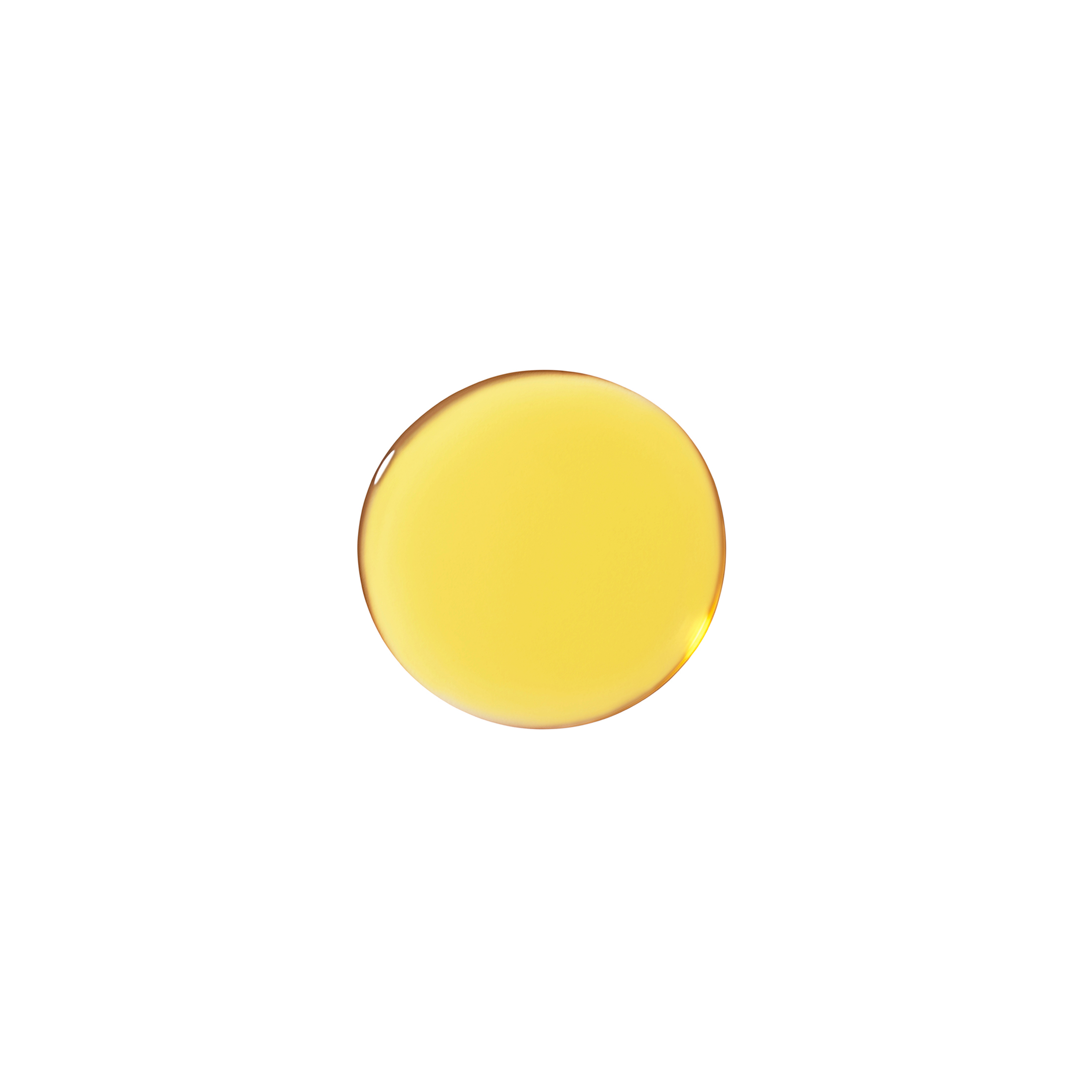 Droplet of yellow face serum on a white background