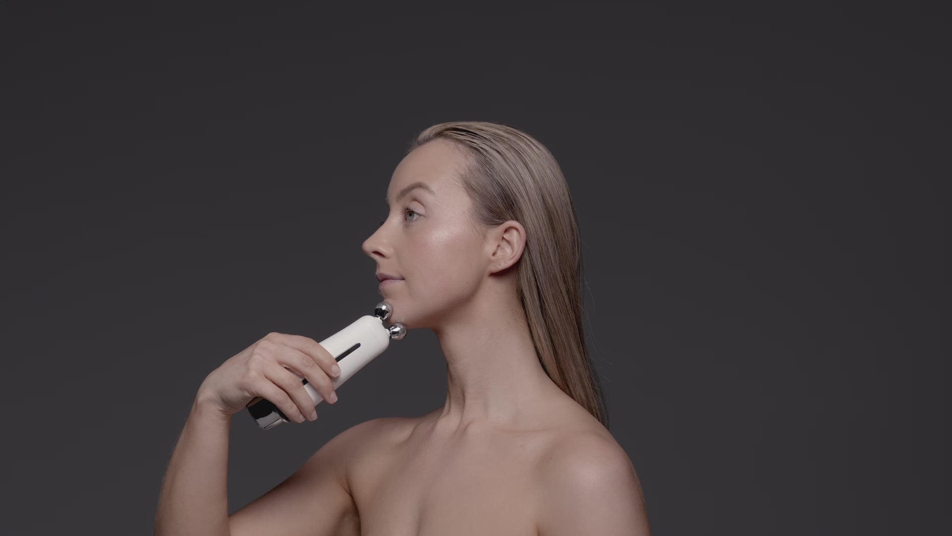 A video of model using Sculpta device on face