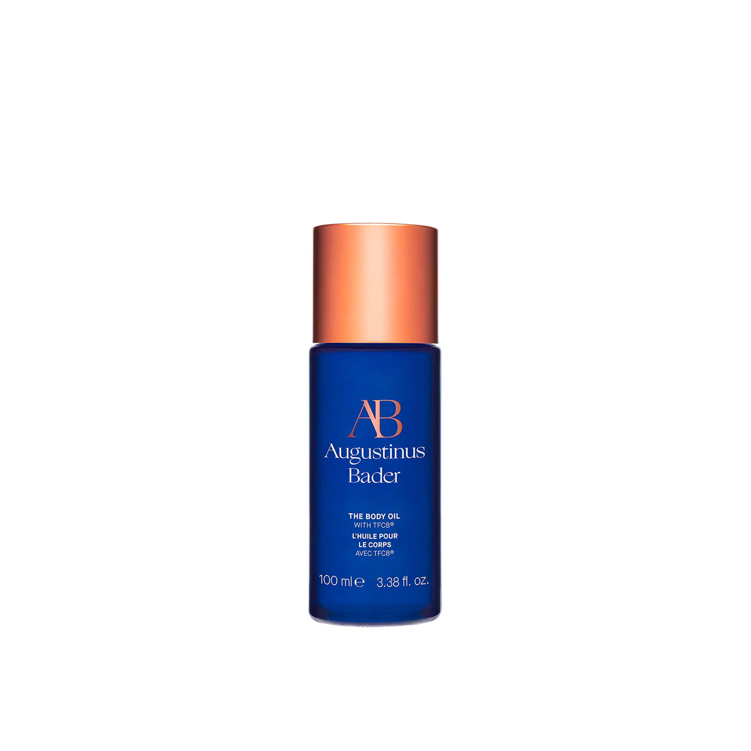 A bottle of body oil in a blue container