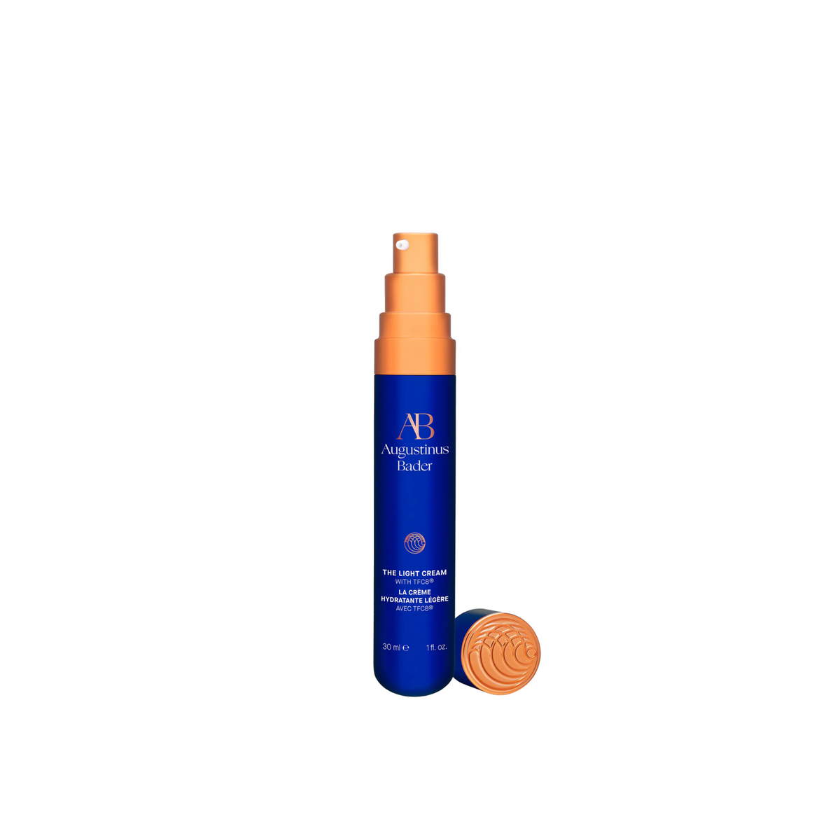 A bottle of Augustinus Bader The Light Cream with the lid off