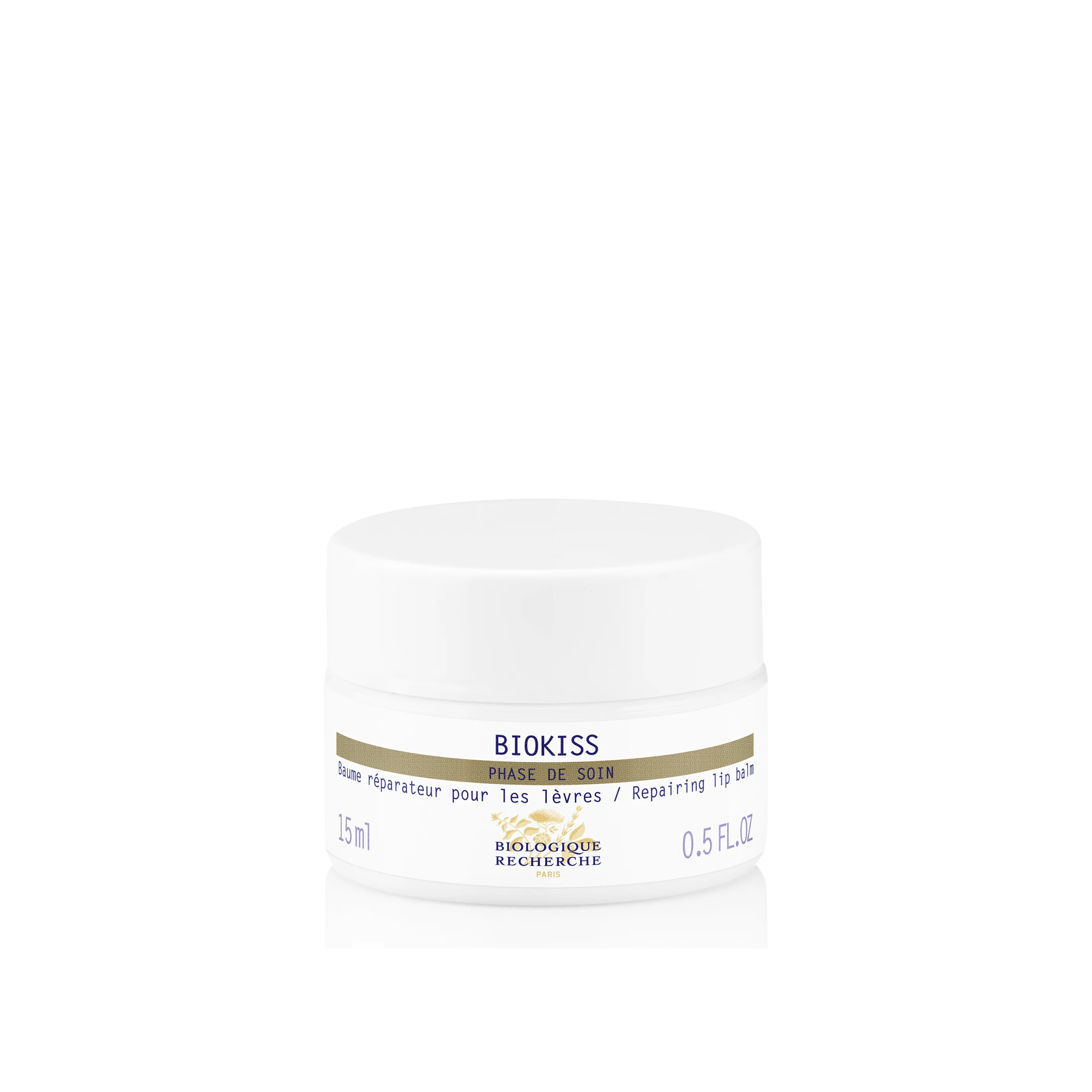 A white jar of Biologique Recherche Biokiss lip treatment with the brand and product name visible on the label.
