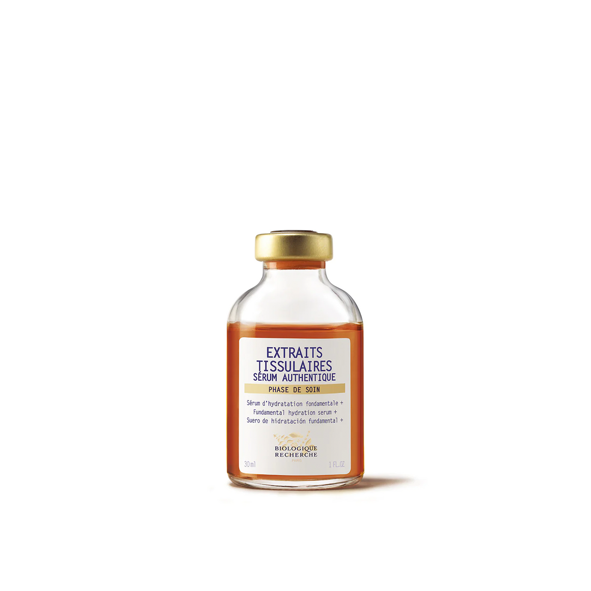 A clear glass vial with a gold cap labeled 'Extraits Tissulaires Serum' against a white background.
