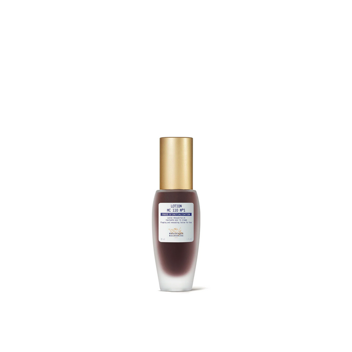 A bottle of Biologique Recherche Lotion MC 110 No1 with a clear cap and a label that includes the product name and information.