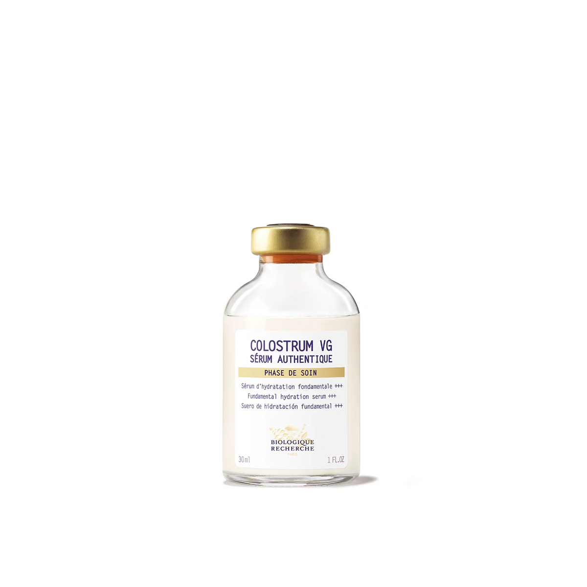 A glass vial of Biologique Recherche Serum Colostrum VG with a white and yellow label, and a gold cap.