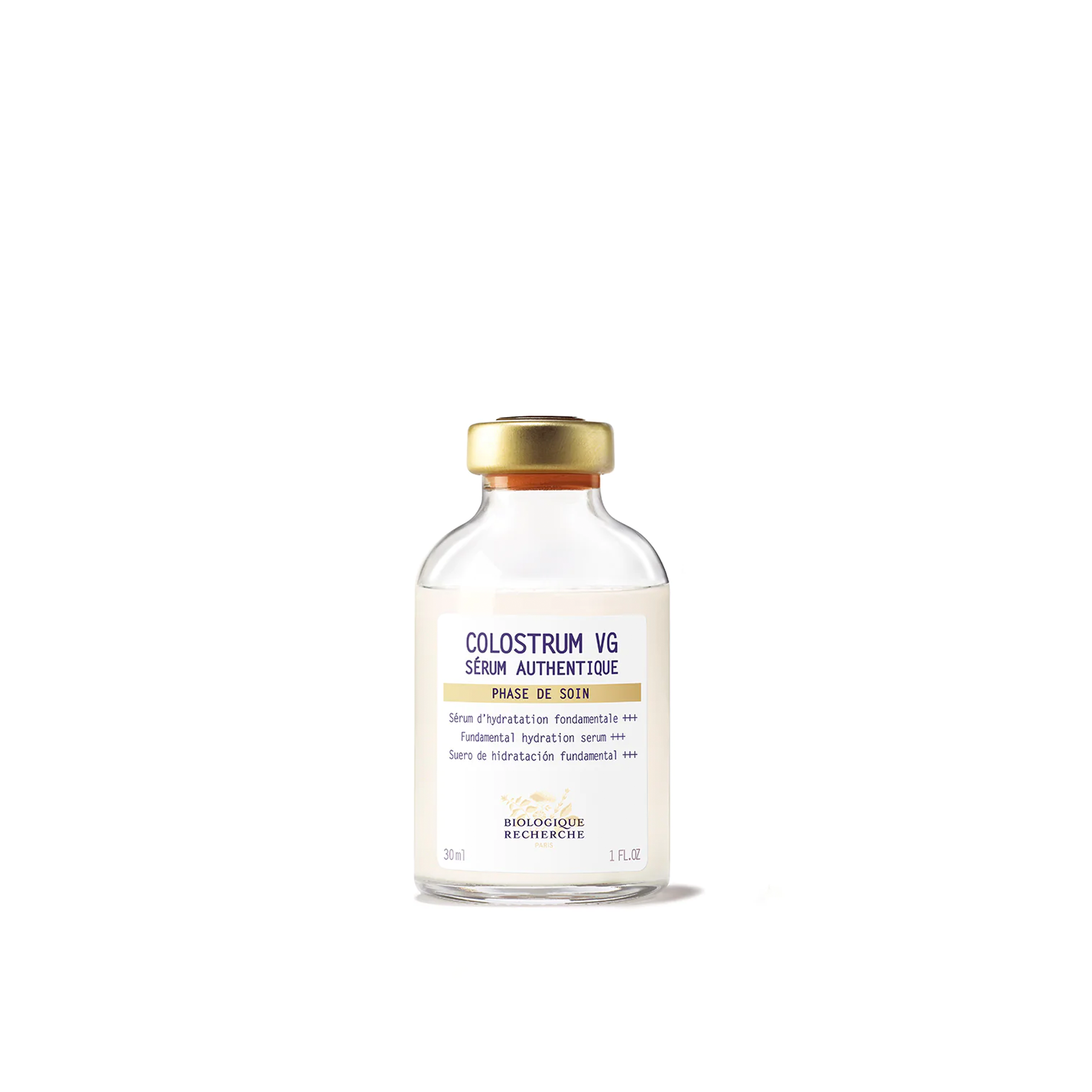 A glass vial of Biologique Recherche Serum Colostrum VG with a white and yellow label, and a gold cap.