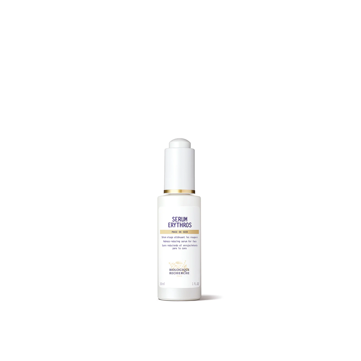 A white bottle with a dropper containing the Biologique Recherche Serum Erythros, designed for calming treatment of redness and sensitivity on the skin.