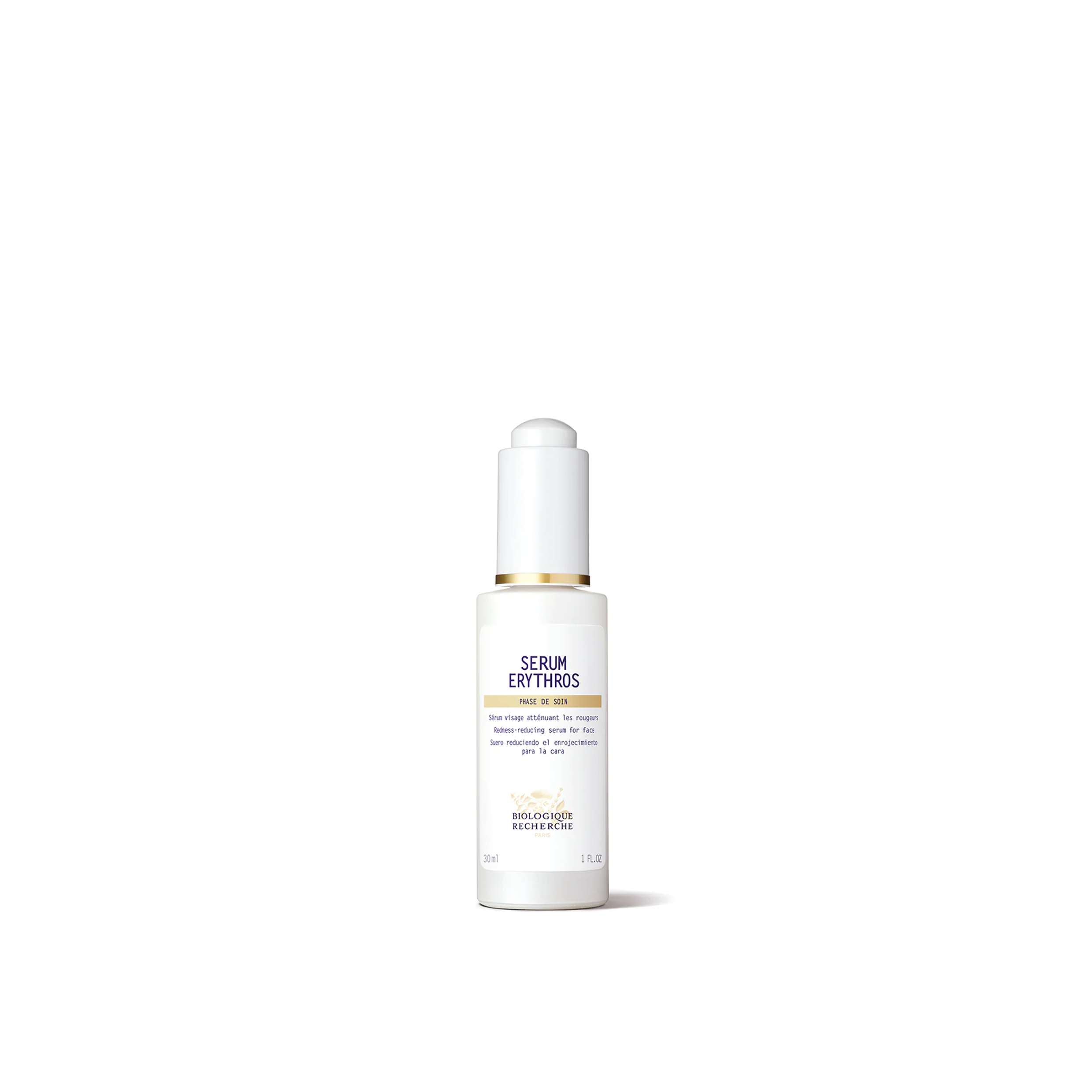 A white bottle with a dropper containing the Biologique Recherche Serum Erythros, designed for calming treatment of redness and sensitivity on the skin.