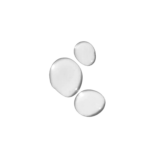 Droplets of facial toner on a white background