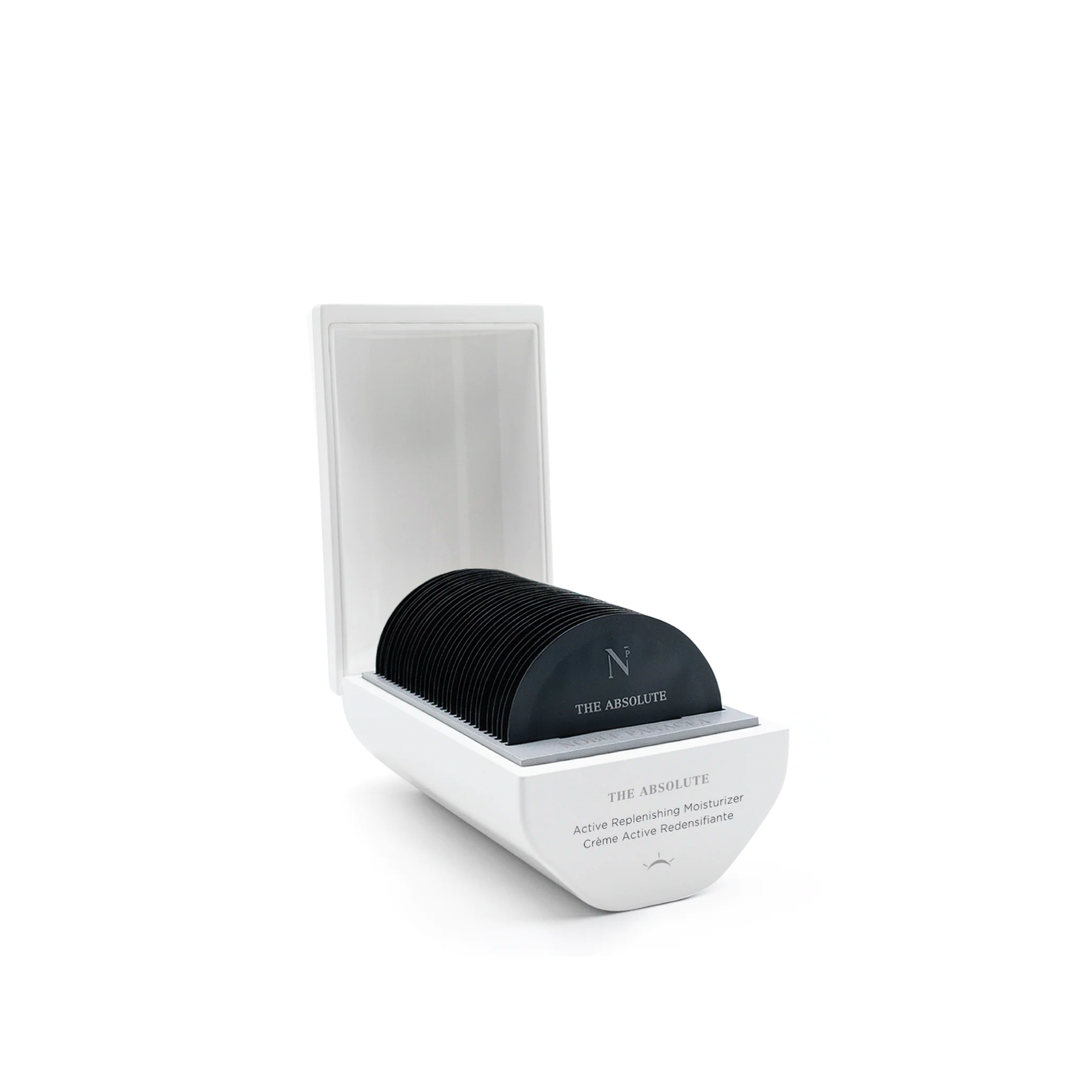 A white box containing doses of Noble Panacea moisturiser, with the brand's logo visible on the box.