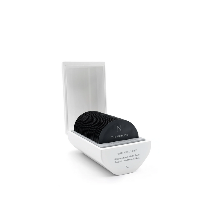 A white container of Noble Panacea The Absolute Rejuvenation Night Balm, set against a white background.