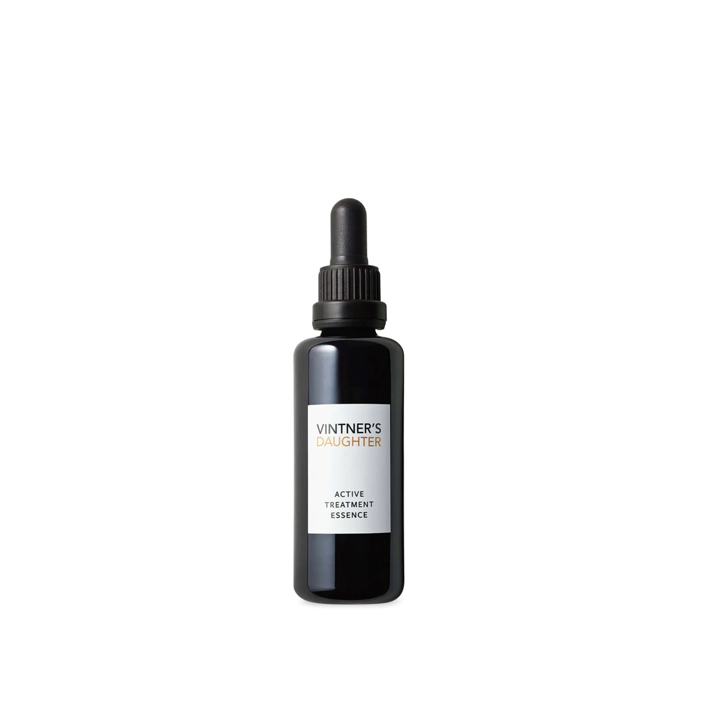 A black bottle with a dropper containing the Vintner's Daughter Active Treatment Essence, labeled for facial use.